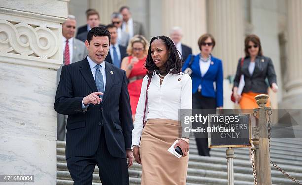 Rep. Jason Chaffetz, R-Utah, left, and Rep. Mia Love, R-Utah, talk as they walk down the House steps following votes in the U.S. Capitol on Thursday,...