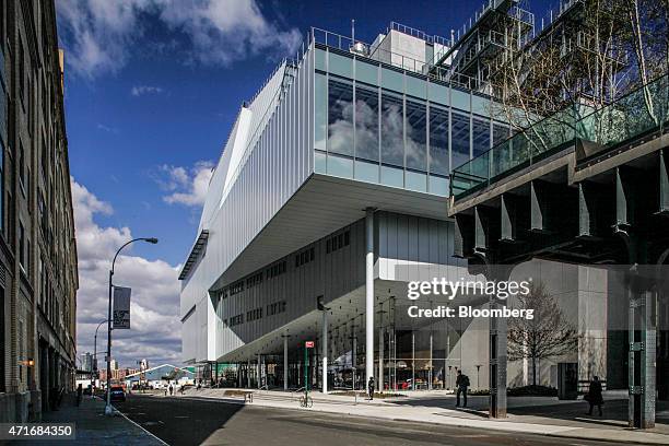 The new Whitney Museum of American Art, right, stands in New York, U.S., on Thursday, April 23, 2015. The Whitney Museum of American Art plans to...