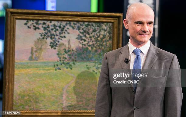 Pictured: Conor Jordan, Christie's Deputy Chairman, Impressionist and Modern Art, with a rare 1888 Claude Monet, "Paysage de matin," estimated at $6...