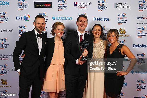 Jenny Jones poses with the winners of Best Sponsorship of Team or Individual Award, sponsored by Kantar Media presented to O2 England Rugby at the BT...
