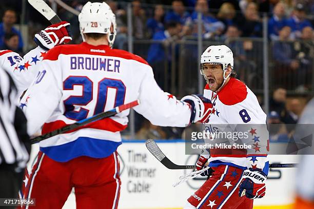 Alex Ovechkin of the Washington Capitals celebrates his first period goal against the New York Rangers in Game One of the Eastern Conference...