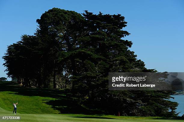 Jordan Spieth hits an approach shot on the 11th fairway during round two of the World Golf Championship Cadillac Match Play at TPC Harding Park on...