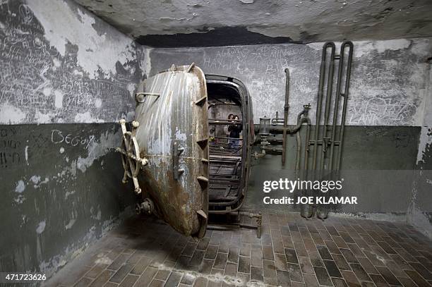 Students tour the disinfection/washing room during a visit to former Nazi concentration camp Mauthausen, northern Austria on April 28, 2015. AFP...