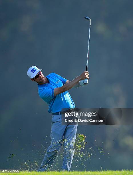 Mikko Ilonen of Finland plays his third shot at the par 4, 12th hole during round two of the World Golf Championship Cadillac Match Play at TPC...