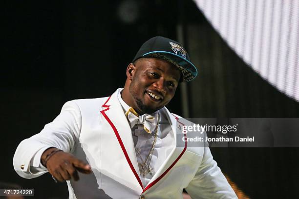 Dante Fowler Jr. Of the Florida Gators walks on stage after being chosen overall by the Jacksonville Jaguars during the first round of the 2015 NFL...