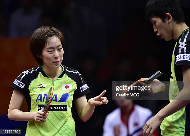 Maharu Yoshimura and Kasumi Ishikawa of Japan react against Kim Hyok Bong and Kim Jong of North Korea during Mixed Doubles Semi-final Match on day...