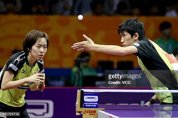Maharu Yoshimura and Kasumi Ishikawa of Japan compete against Kim Hyok Bong and Kim Jong of North Korea during Mixed Doubles Semi-final Match on day...