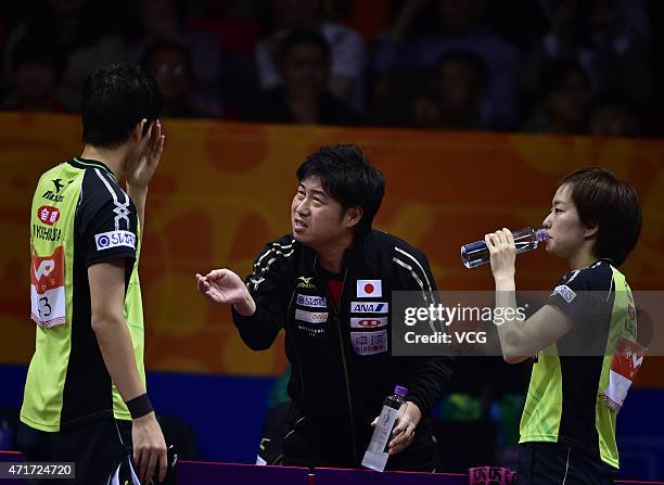 Maharu Yoshimura and Kasumi Ishikawa of Japan react against Kim Hyok Bong and Kim Jong of North Korea during Mixed Doubles Semi-final Match on day...