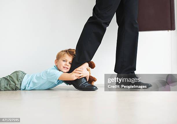 separation anxiety in action - dragging stock pictures, royalty-free photos & images