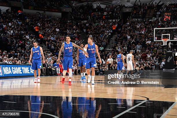 April 30: Matt Barnes high fives Blake Griffin of the Los Angeles Clippers during Game Six of the Western Conference Quarterfinals against the San...