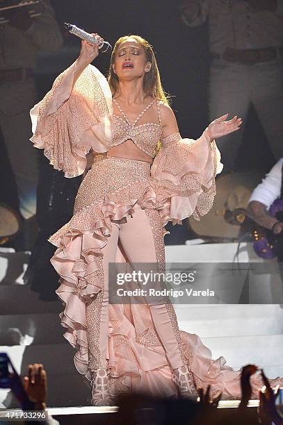 Jennifer Lopez performs musical tribute to Selena performs onstage at the 2015 Billboard Latin Music Awards presented bu State Farm on Telemundo at...