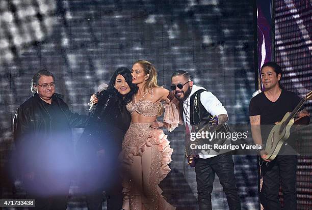 Jennifer Lopez and Los Dinos onstage after performing musical tribute to Selena at the 2015 Billboard Latin Music Awards presented bu State Farm on...