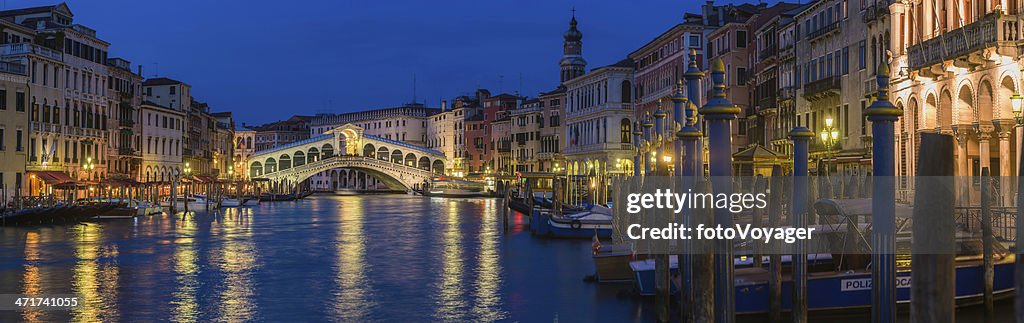 Venice Rialto Bridge Grand Canal gondolas illuminated landmark panorama Italy