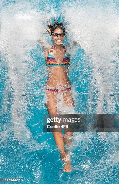 pool fun, splash - vertical jump stock pictures, royalty-free photos & images