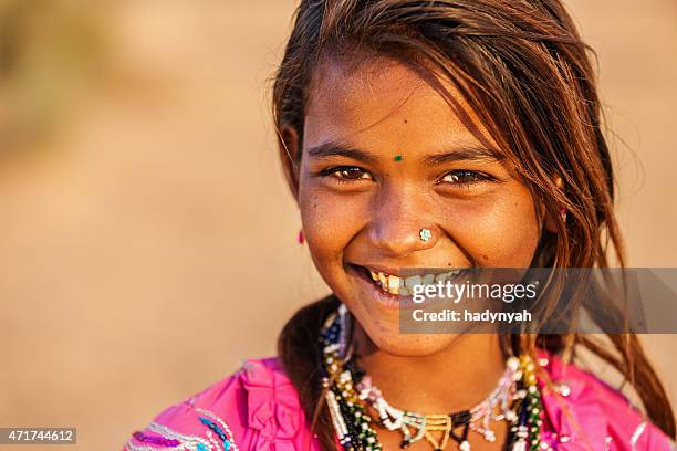 happy indian girl in desert village, india - gipsy stock pictures, royalty-free photos & images