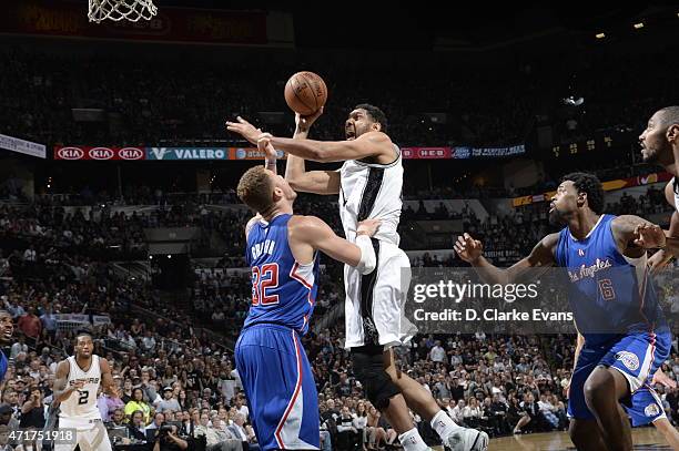 Tim Duncan of the San Antonio Spurs goes up for a shot against the Los Angeles Clippers in Game Six of the Western Conference Quarterfinals at the...