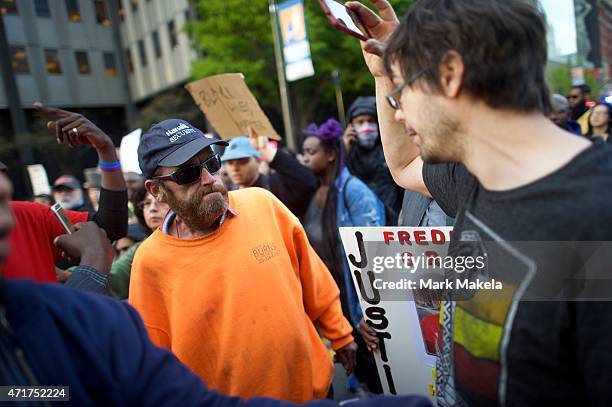 Man attempts to disrupt protestors as they demonstrate over the death of Freddie Gray on April 30, 2015 in Philadelphia, Pennsylvania. Freddie Gray...