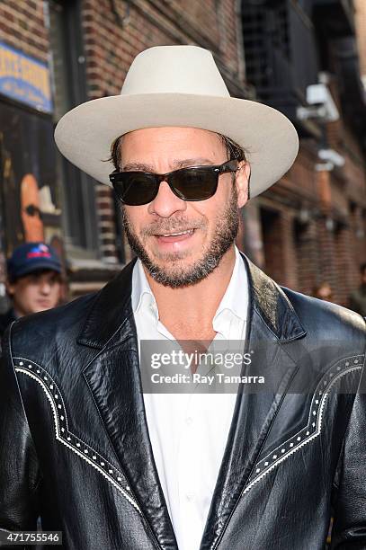 Singer Amos Lee enters the "Late Show With David Letterman" taping at the Ed Sullivan Theater on May 5, 2015 in New York City.