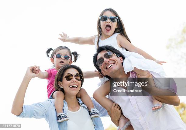 happy family on holidays - happy holidays family stock pictures, royalty-free photos & images