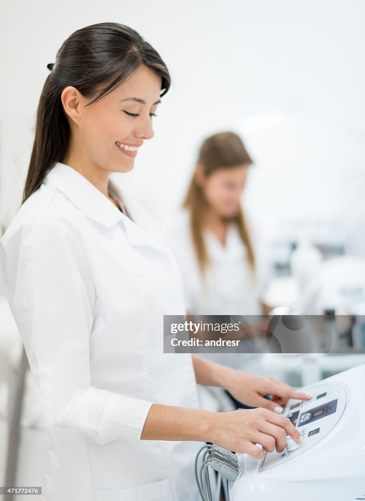 Dermatologist using ultrasound machines