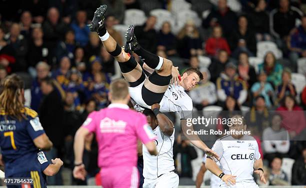 Stephan Lewies of the Sharks is held up by his team-mate Tendai Mtawarira to secure the kick-off during the round 12 Super Rugby match between the...