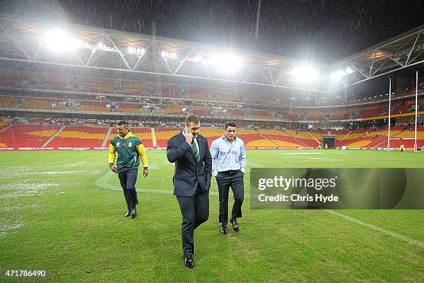 Will Chamber, Trent Merrin and Cooper Cronk inspect the field before the Trans-Tasman Test match between the Australia Kangaroos and the New Zealand...