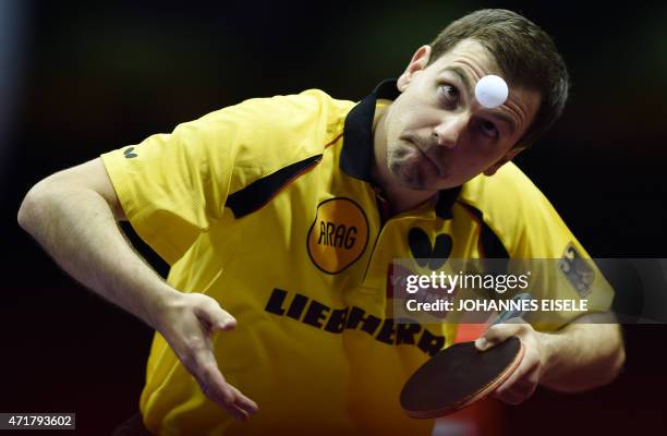 Boll Timo of Germany serves during his men's singles match against Wong Chun Ting of Hong Kong at the 2015 World Table Tennis Championships at the...