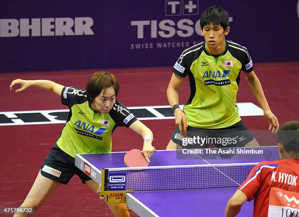 Maharu Yoshimura and Kasumi Ishikawa of Japan compete against Kim Hyok Bong and Kim Jong of North Korea during Mixed Doubles Semi-final Match on day...