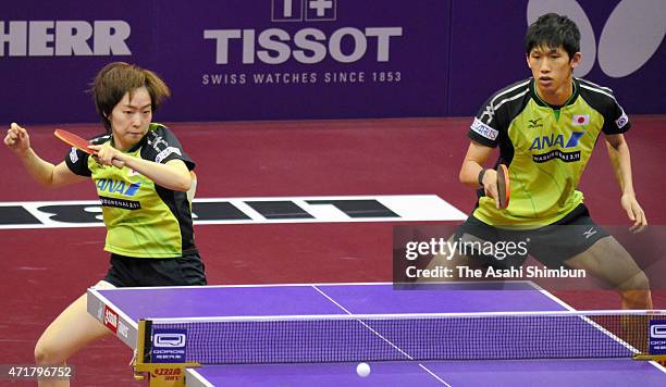 Maharu Yoshimura and Kasumi Ishikawa of Japan compete against Kim Hyok Bong and Kim Jong of North Korea during Mixed Doubles Semi-final Match on day...