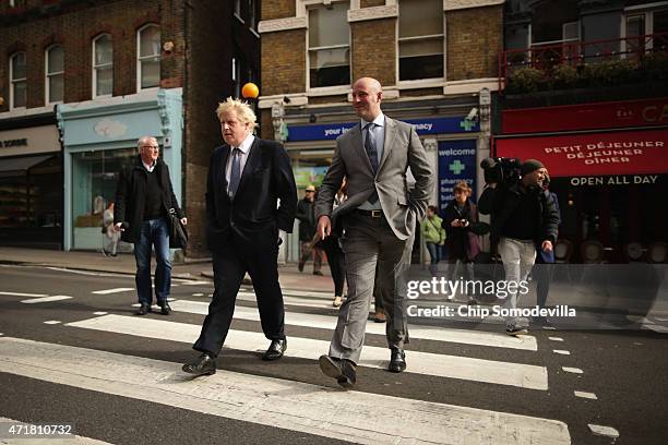 London Mayor Boris Johnson campaigns with Simon Marcus, Conservative prospective parliamentary candidate for Hampstead and Kilburn, on May 1, 2015 in...