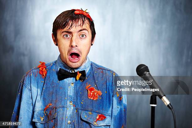 looks like the joke's on him - comedian performing stock pictures, royalty-free photos & images
