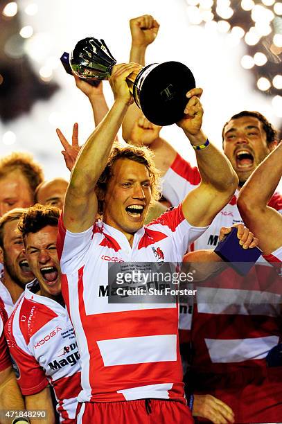 Captain Billy Twelvetrees of Gloucester lifts the trophy following his team's victory during the European Rugby Challenge Cup Final match between...