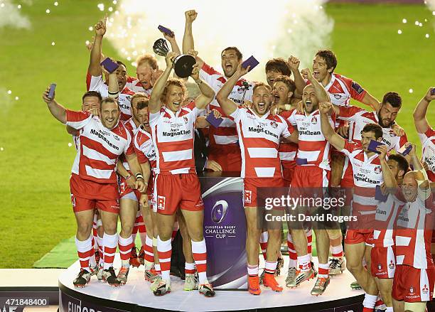 Billy Twelvetrees, the Gloucester captain, raises the trophy after their victory during the European Rugby Challenge Cup Final match between...