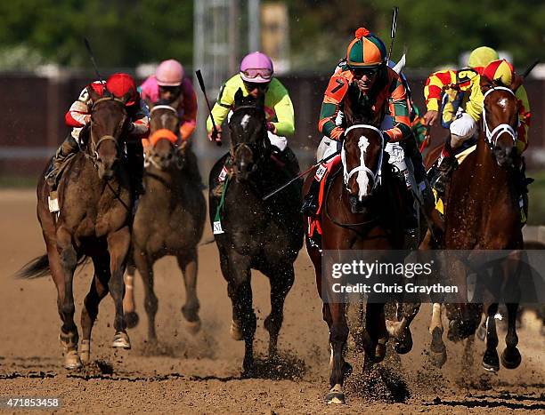 Lovely Maria, ridden by Kerwin D. Clark, leads the field to the finish line to win the 141st running of the Kentucky Oaks at Churchill Downs at...