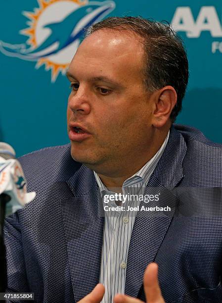 Executive Vice President of Football Operations Mike Tannenbaum answers a question from the media after introducing DeVante Parker on May 1, 2015 at...