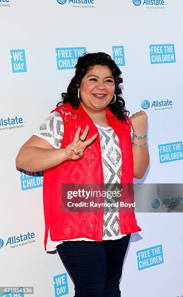 Singer and actress Raini Rodriguez from the television show "Austin & Ally", poses for photos on the red carpet during "We Day" at the Allstate Arena...