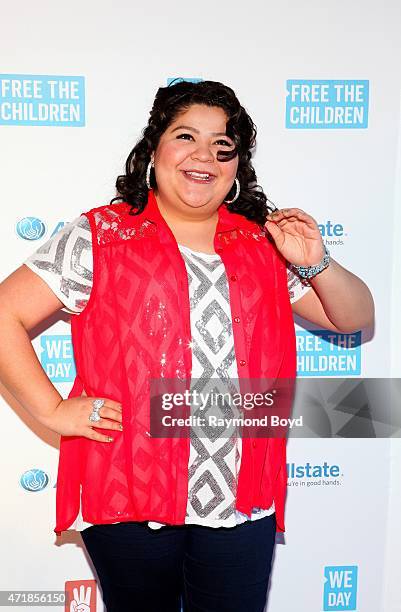 Singer and actress Raini Rodriguez from the television show "Austin & Ally", poses for photos on the red carpet during "We Day" at the Allstate Arena...