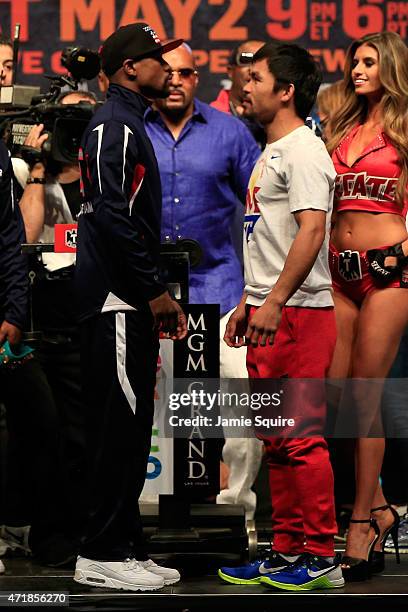 Floyd Mayweather Jr. And Manny Pacquiao face off during their official weigh-in on May 1, 2015 at MGM Grand Garden Arena in Las Vegas, Nevada. The...