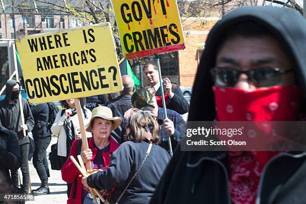 Demonstrators participate in a May Day march on May 1, 2015 in Chicago, Illinois. The demonstration was one of many around the world on what has...