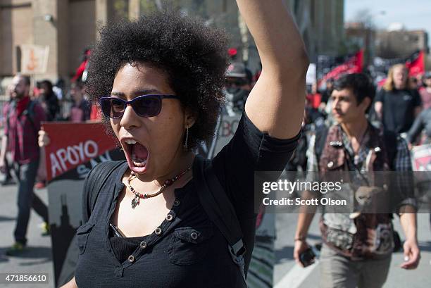 Demonstrators participate in a May Day march on May 1, 2015 in Chicago, Illinois. The demonstration was one of many around the world on what has...