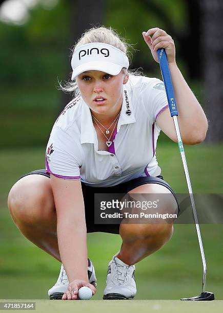Brooke M. Henderson of Canada lines up a putt on the seventh green during Round Two of the 2015 Volunteers of America North Texas Shootout Presented...