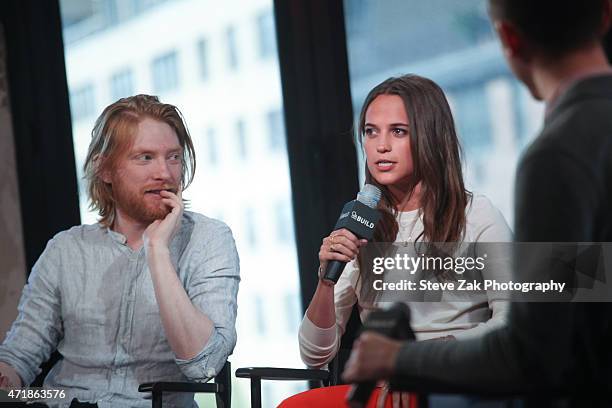 Domhnall Gleeson and Alicia Vikander discuss their film 'Ex Machina' at AOL Studios during the AOL BUILD Speaker Series on May 1, 2015 in New York...