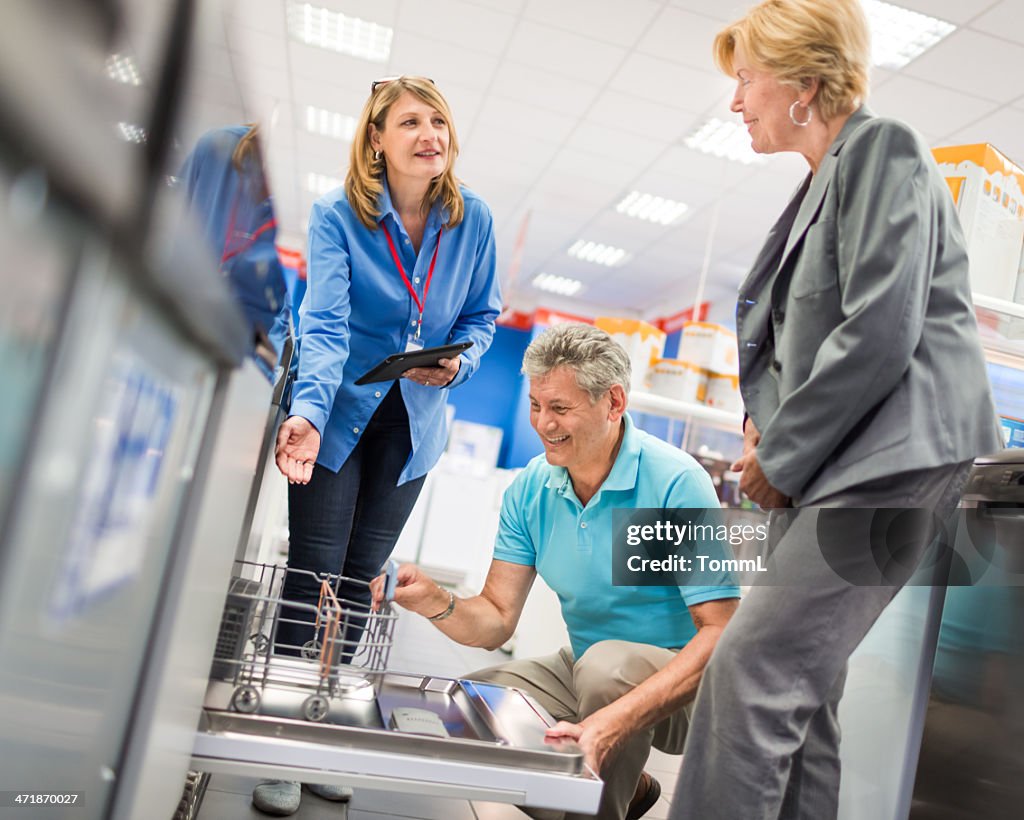 Senior Couple Shopping In Appliance Store