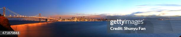 san francisco: skyline super panorama - golden gate bridge night stock pictures, royalty-free photos & images