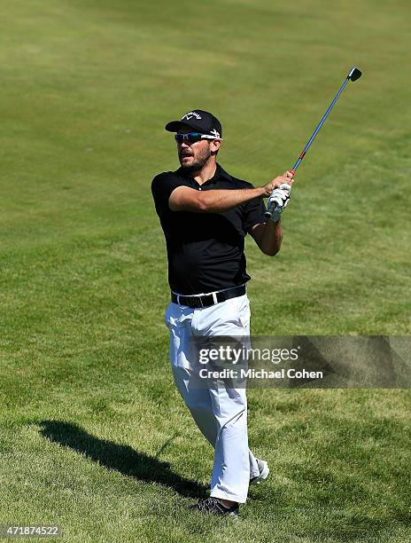 Julian Etulain of Argentina hits his second shot on the 17th hole during the second round of the United Leasing Championship held at Victoria...