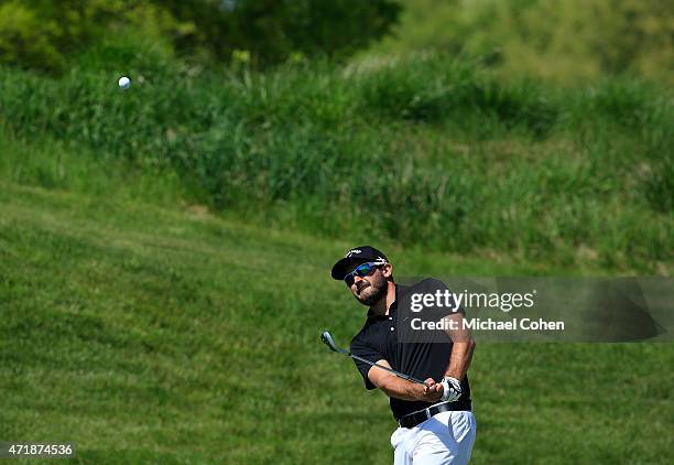 Julian Etulain of Argentina hits his third shot on the 17th hole during the second round of the United Leasing Championship held at Victoria National...