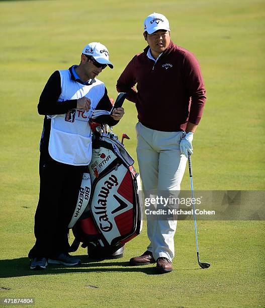 Todd Baek looks on by his golf bag on the fourth hole during the second round of the United Leasing Championship held at Victoria National Golf Club...