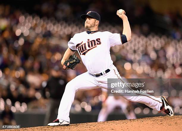 Jordan Schafer of the Minnesota Twins delivers a pitch against the Chicago White Sox during the ninth inning of the game on May 1, 2015 at Target...