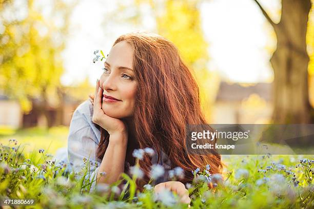 beautiful redhead outdoors - beautiful woman stock pictures, royalty-free photos & images