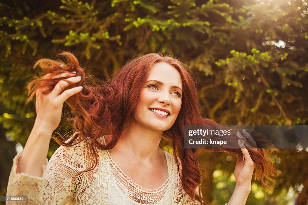 Beautiful redhead outdoors